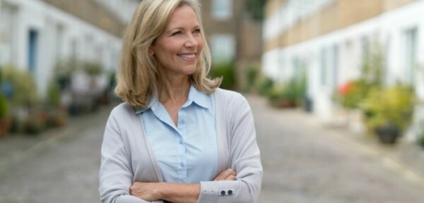 Woman looking at mews houses