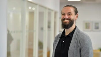 Sam Bowden, Sava's Senior Course Advisor, photographed in the Sava offices