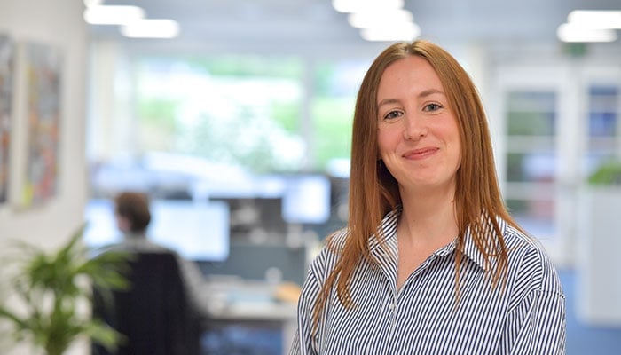 Hayley Bowkett, Sava's Scheme and Communications Coordinator, photographed in the Sava offices