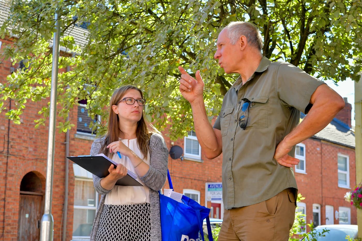 A Sava trainer and Sava student during a practical surveying day in Milton Keynes as part of the Diploma in Residential Surveying and Valuation